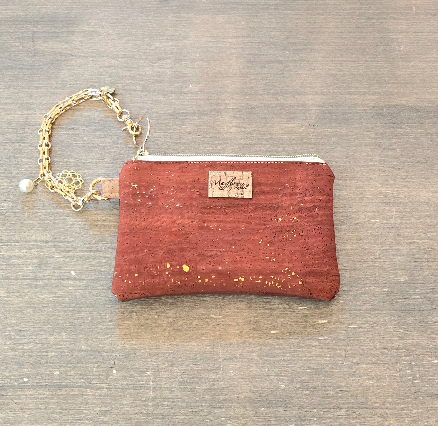 Wristlet bag with golden bracelet