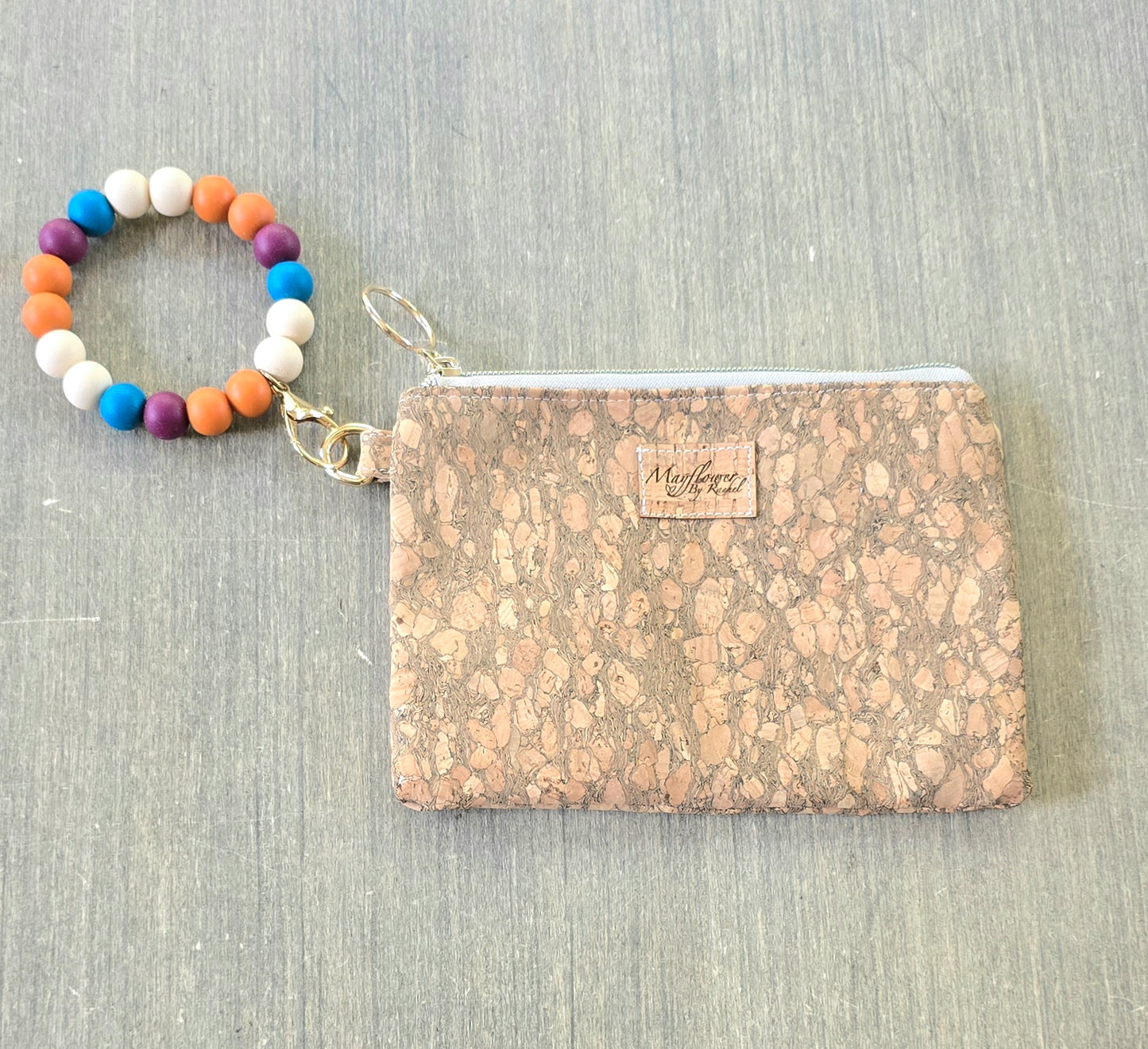 Wristlet bag with silicone beads bracelet