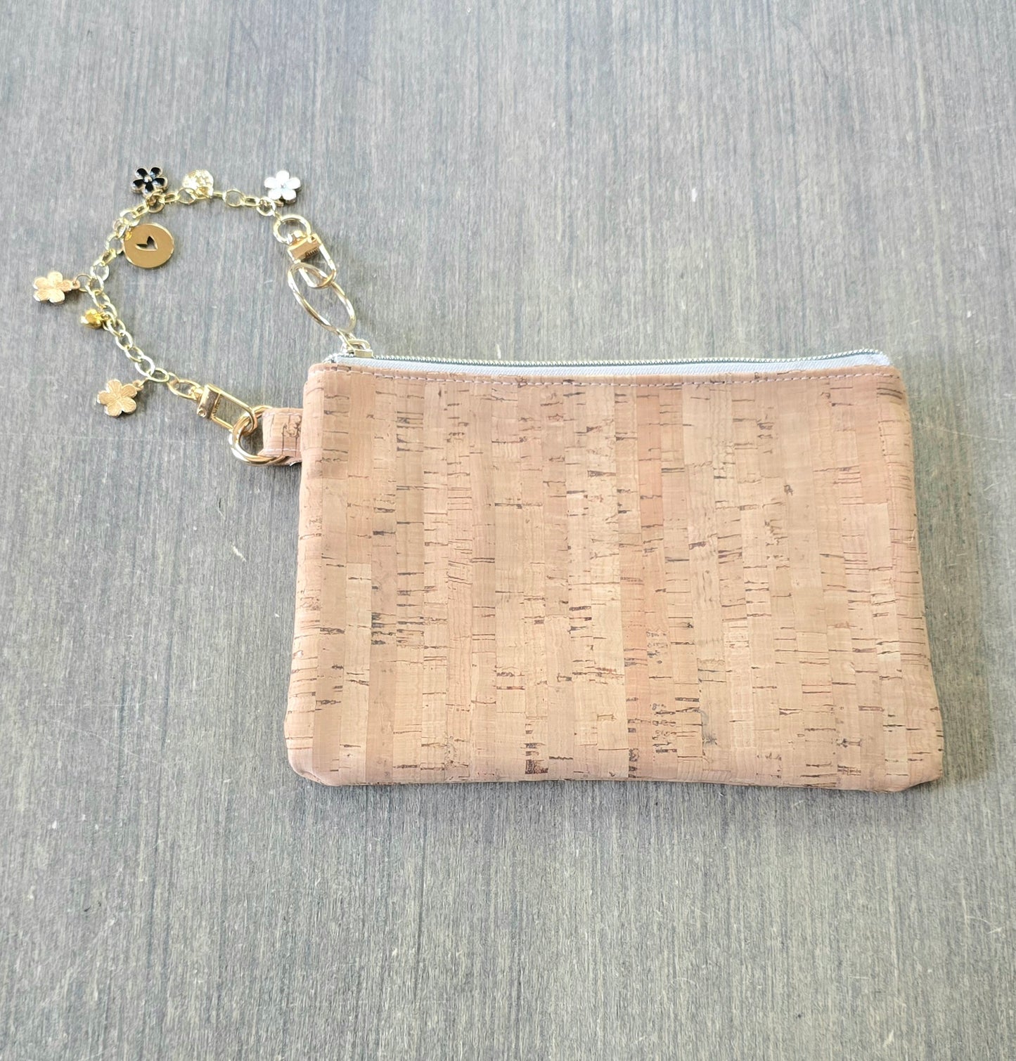 Wristlet bag with gold bracelet