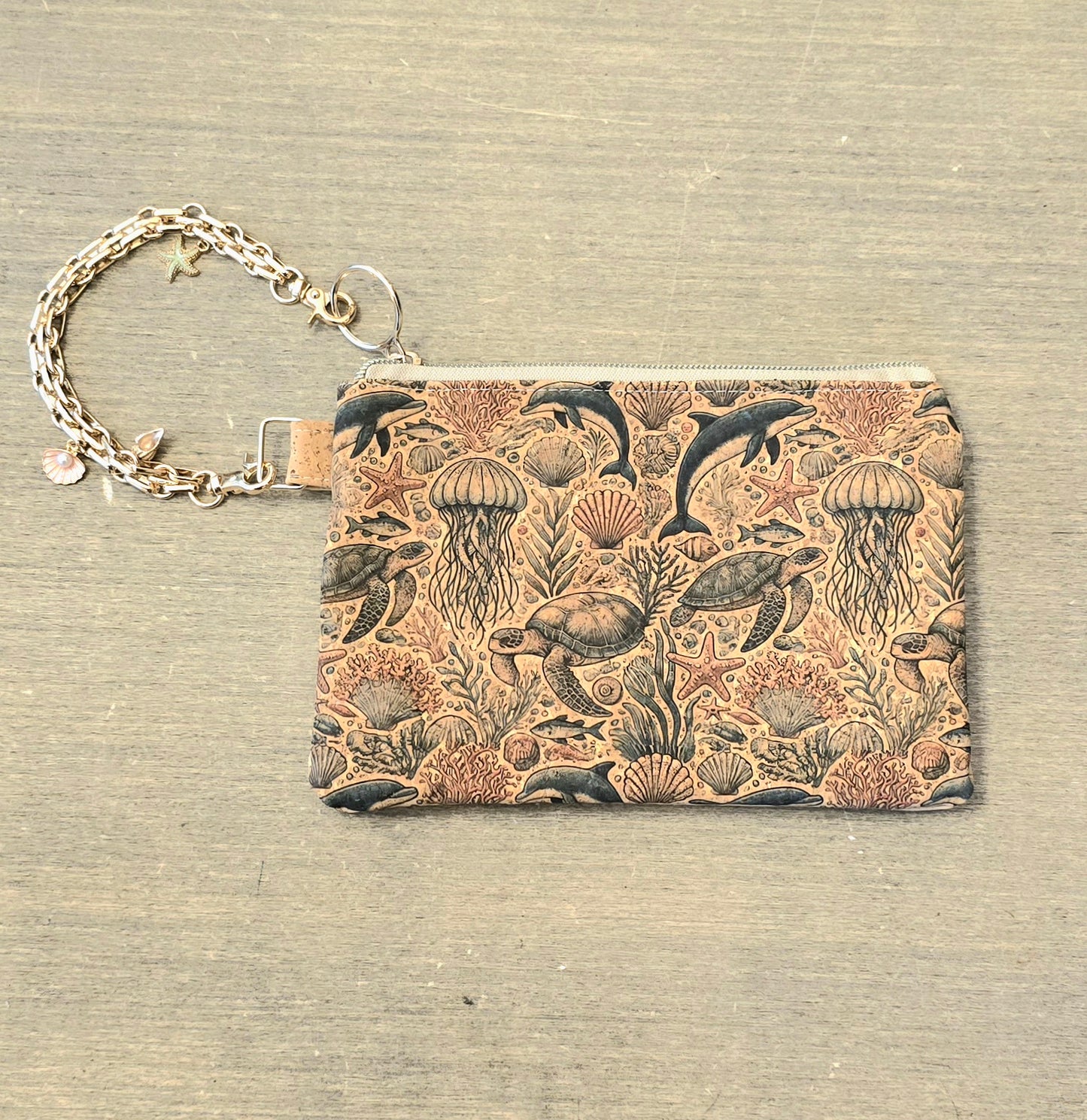 Sea Life Wristlet Bag with gold bracelet charm