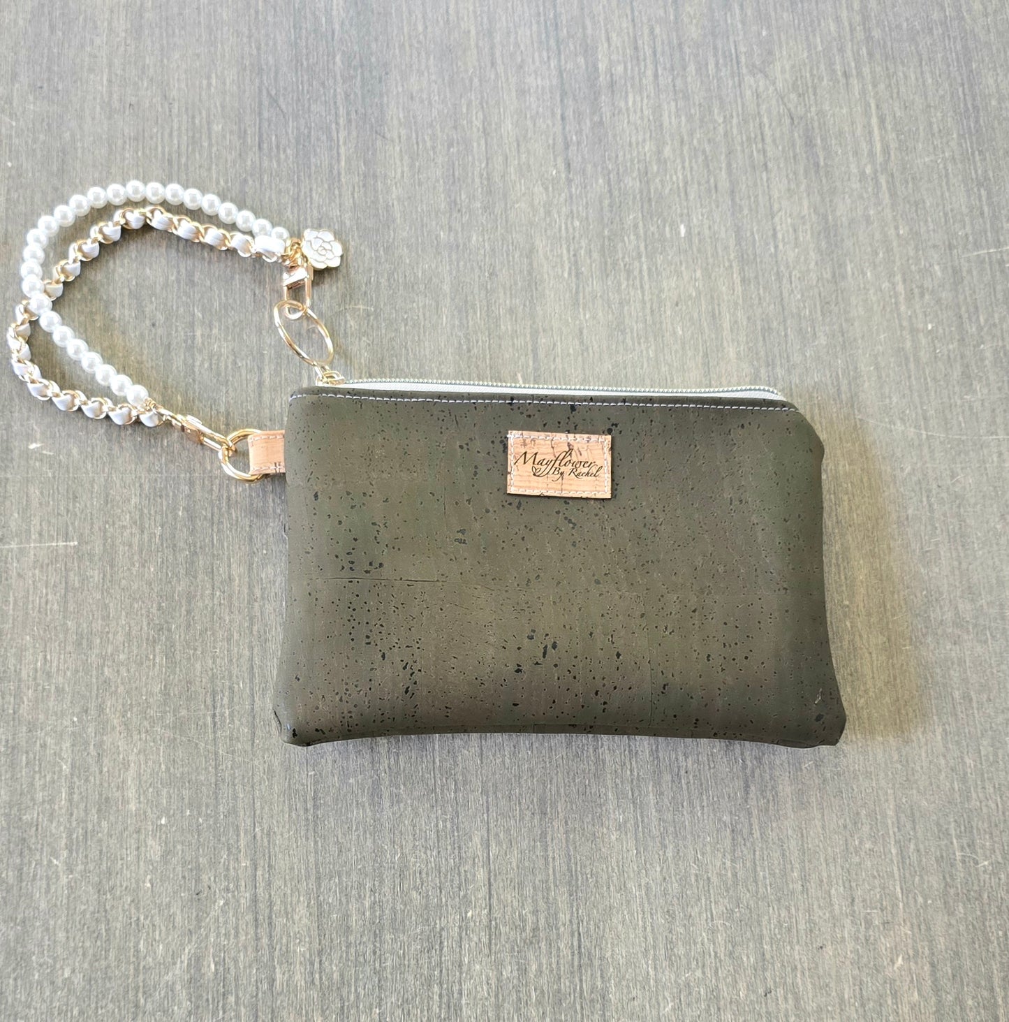 Wristlet bag with bracelet